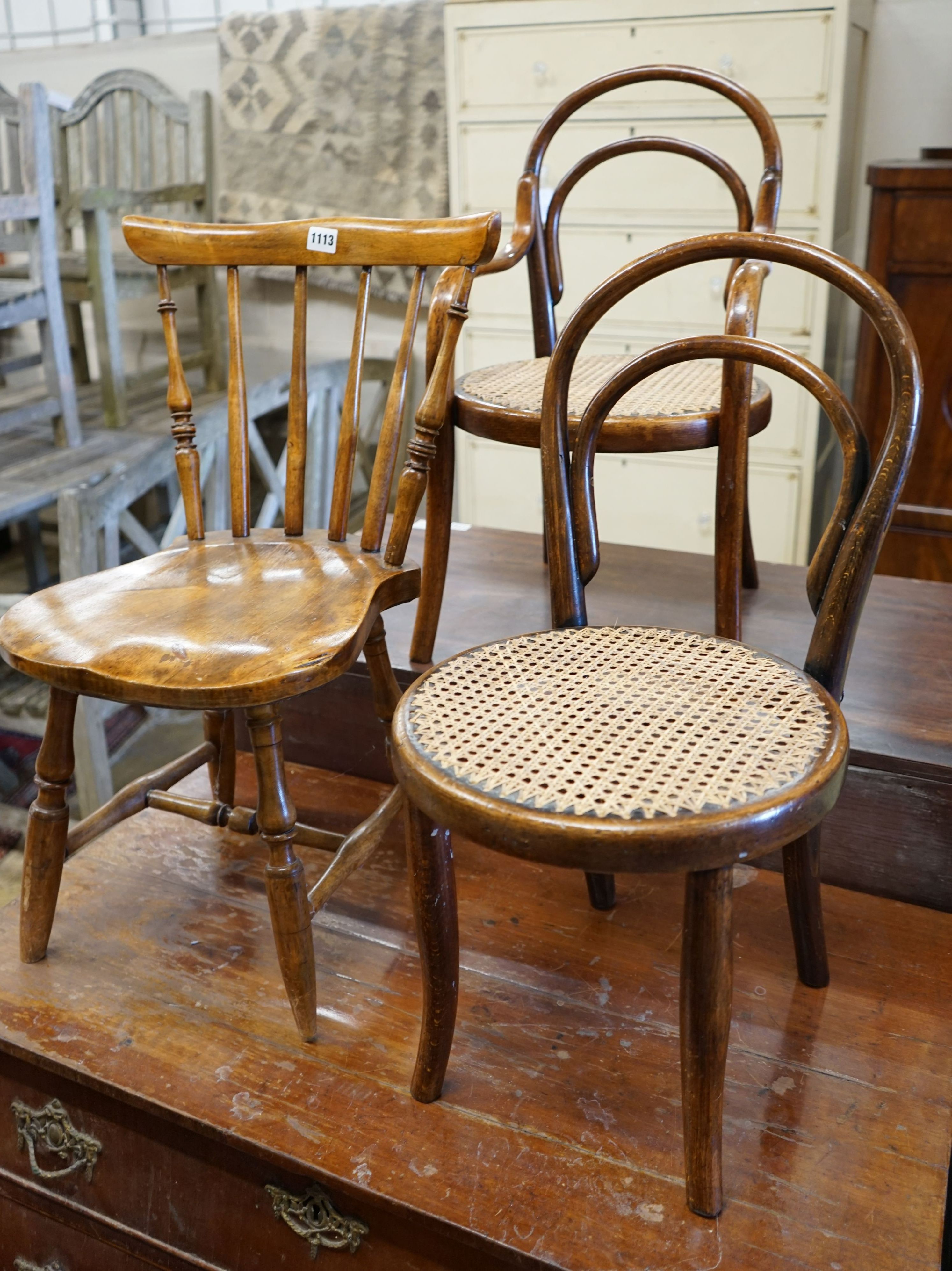 Two early 20th century childs' beach cane seat bentwood chairs and a child's Windsor chair